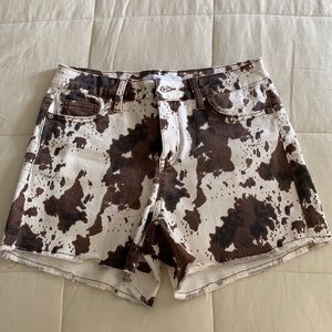 High waisted cow print shorts